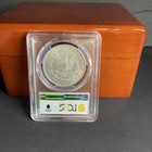 PCGS AU55 1880-O MORGAN DOLLAR GOLD SHEILD