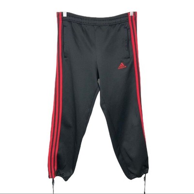 black adidas joggers red stripes