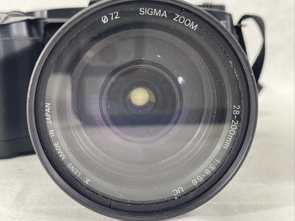 Paquete de lente y cámara Sigma SA-5 zoom SIGMA 28-200 mm lente - flash EF-430 Foto 2 de 4