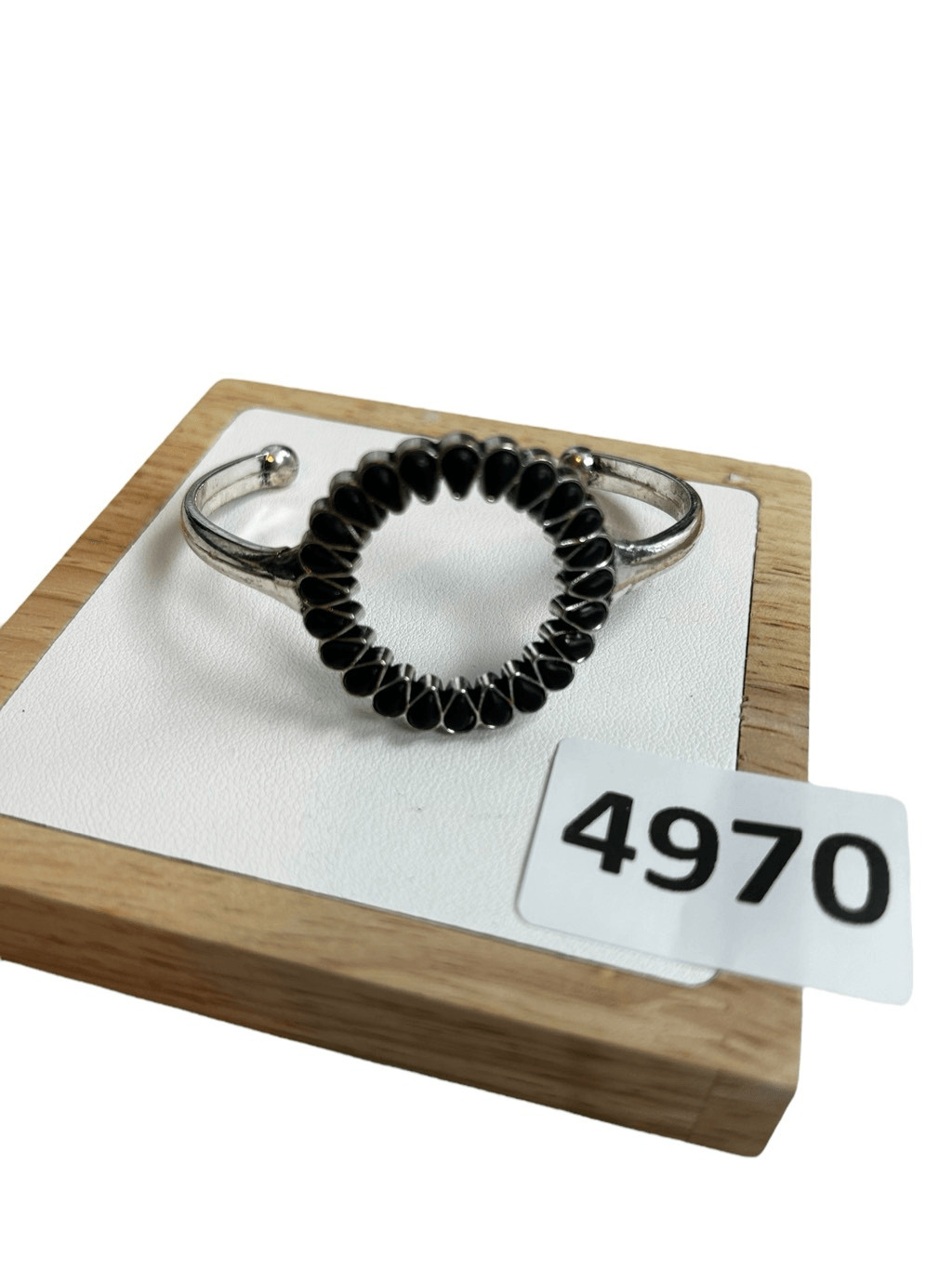 Silver and black open circle patterned cuff brace… - image 10