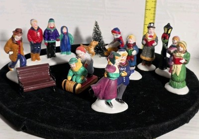 LEMAX Christmas lot village People Set Of 10 Pieces Carolers, Sledding and more!