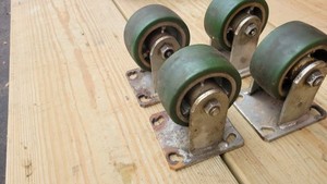 set of 4 fixed Albion 4" X 2" Rigid Casters, No Brake, part aj 0420219 as shown