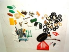VINTAGE LOT OF SMALL PARTS AND WHEELS FOR MATCHBOX AND OTHER BRANDS