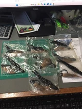 8 VINTAGE BLACK/BROWN BUCKTAIL JIGS WITH 4" PLASTIC TRAILERS NIPS