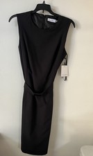 Calvin Klein Sleeveless Cocktail Dress, Size 12 petite With Belt Back Zip. Lined