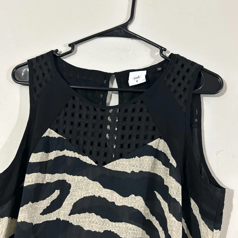 Camiseta sin mangas Cabi para mujer negra con estampado de cebra talla M Foto 3 de 4