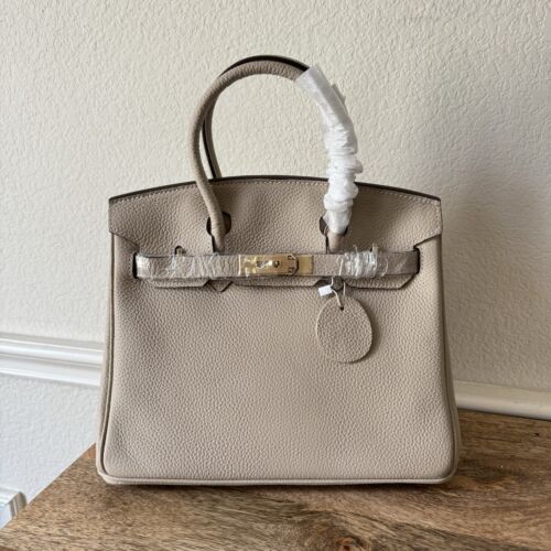 *READ Light Beige Pebble Leather 30 Bag Belted Lock Key Satchel w/ Gold HW - Picture 1 of 19