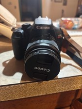 Canon EOS Rebel T100 DSLR Camera with EF-S 18-55mm f/3.5-5.6 Lens