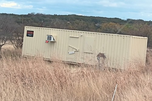 Land and Converted   Shipping Container Cabin