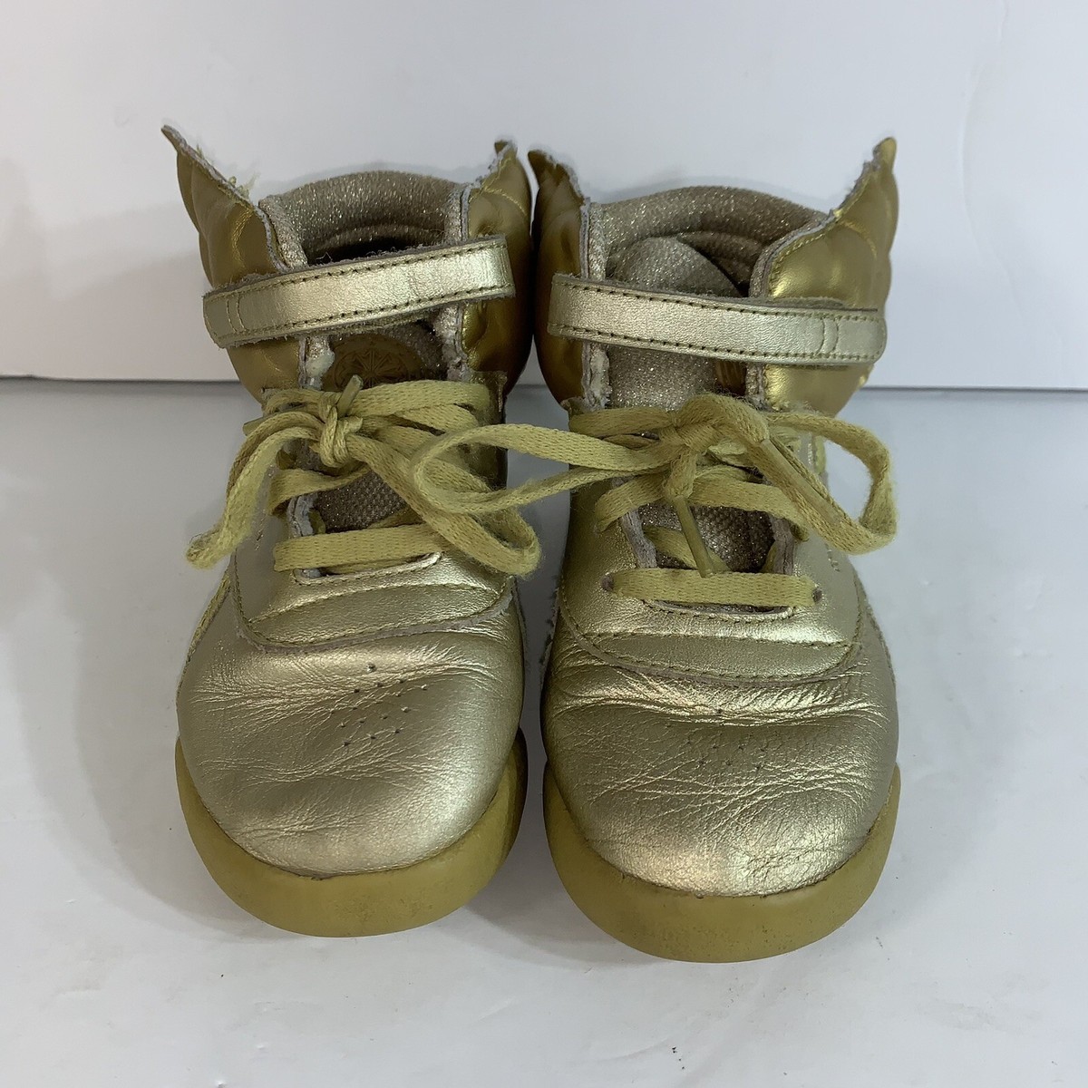reebok freestyle hi gold