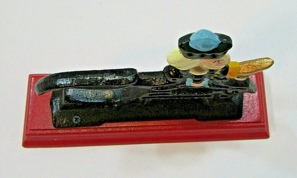 Cascanueces hombre soldado de hierro fundido pintado a mano de 1990 sobre base de madera roja envío y devolución gratuitos Foto 3 de 4