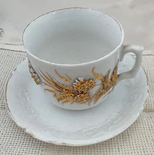 Vintage Porcelain Teacup & Saucer Set – Raised Gold Floral Design Unmarked