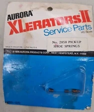 AURORA XLERATORS, SLOT CAR HO (4 PICK UP SHOE SPRINGS) #2858. NIP (G1)