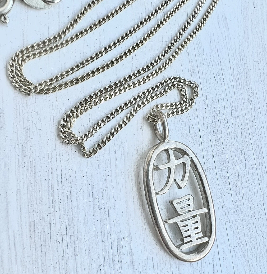 Sterling silver hotsell strength necklace
