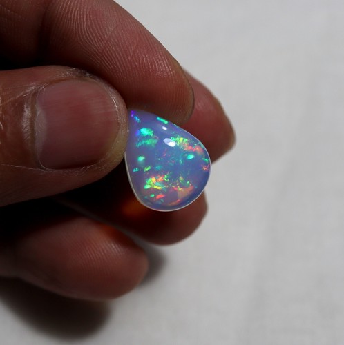 5.7 Carat 17.7x13x6.5 MM Natural Multi Fire Ethiopian Opal Pear Shape Cabochon - Picture 9 of 10