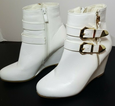 white booties with buckles
