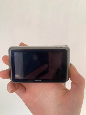 Sony Cybershot Digital Camera DSC-T99 Silver 14.1MP W/ Charger