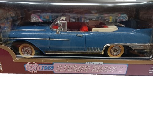 1/18 1958 CADILLAC ELDORADO BIARRITZ CONV., IN GOLD BY ROAD