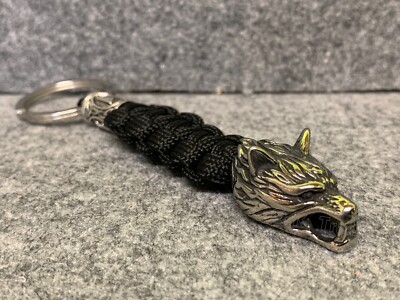 Wolfskopf aus Edelstahl mit Paracord- Farbe Schwarz , Aus   Geschenkbox