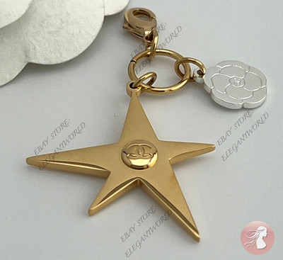 CHANEL Holiday 2025 Camellia Star Comet Charm Keychain Novelty Gold Silver