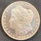 1886 Morgan Silver Dollar BU + DIMPL