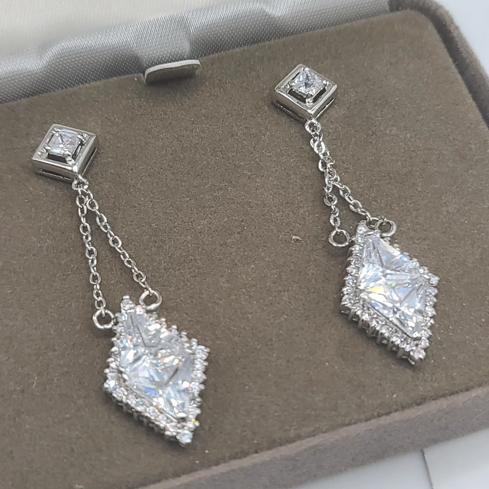 Pendientes Nolan Miller Estrás Colgantes Tono Plata Perforados Foto 2 de 4