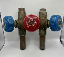 Brass 3/4” Water Softener 3 Valve Bypass Valve With Red And Blue Handles.  Used