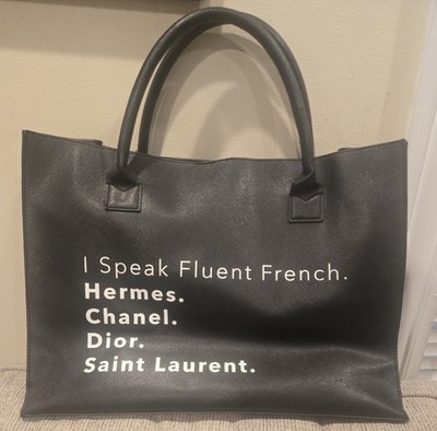  Turn heads with this cheeky, high-style tote from the Los Angeles Trading Co.