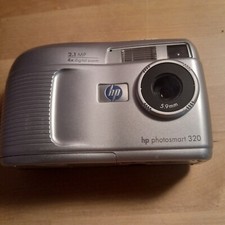 HP PhotoSmart 320 2.1 MP Digital Camera - Silver Y1434A 