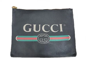Sac pochette Gucci imprimé logo ceinturé 12345 45010306