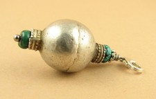 Old Indian Tribal silver pendant with turquoise stones. Fine and sterling silver