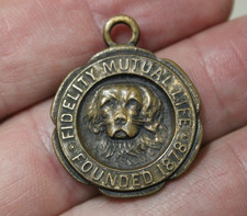 1930S FIDELITY MUTUAL  LIFE INSURANCE CO RETURN KEY FOB WITH A DOG RARE VINTAGE