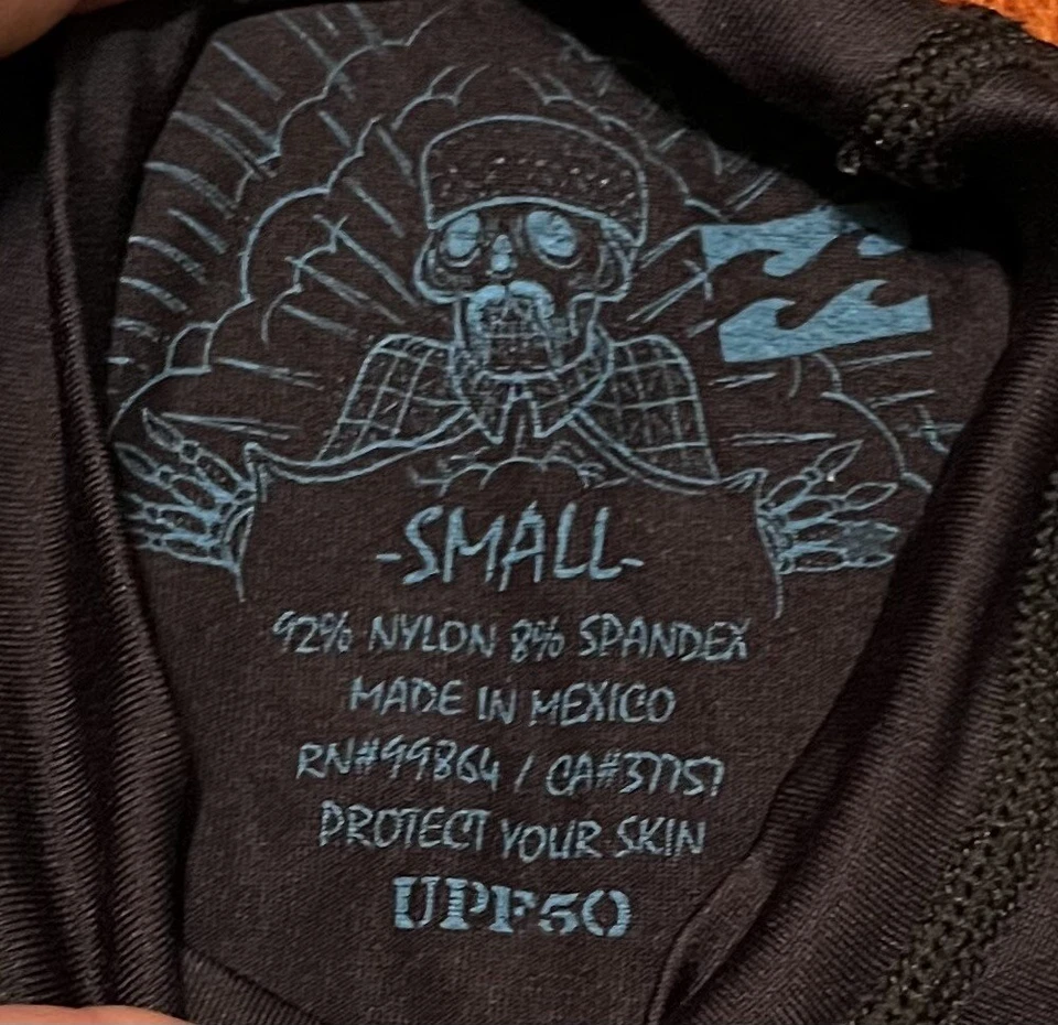 Protector contra erupciones manga corta Billabong negro y azul niños talla pequeña UPF 50 Foto 2 de 4