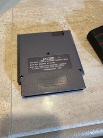 RAD RACER &mdash; NES | BOX + CARTRIDGE + DUST SLEEVE | NO MANUAL | TESTED