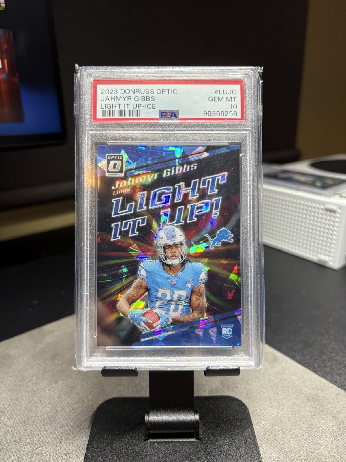 2023 PANINI DONRUSS OPTIC LIGHT IT UP ICE #LUJG JAHMYR GIBBS ROOKIE /15 PSA 10
