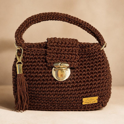 Handmade brown macramé bag with a touch of sparkle.