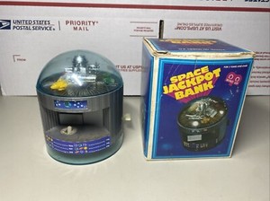 UK Design No. 993204 Space Jackpot Bank Wind Up Piggy Bank