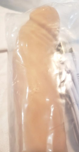 Sex Toys Double Dong, Realistic Vibrator, and Trojan Enz condoms - Picture 11 of 12