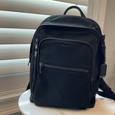 TUMI Black Men's Backpack with Zip Closure and Multiple Pockets