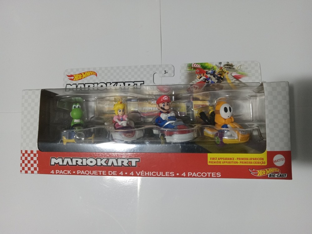 HOT WHEELS MARIOKART 4-PACK WITH AN EXCLUSIVE ORANGE SHY GUY ON A STANDARD KART!