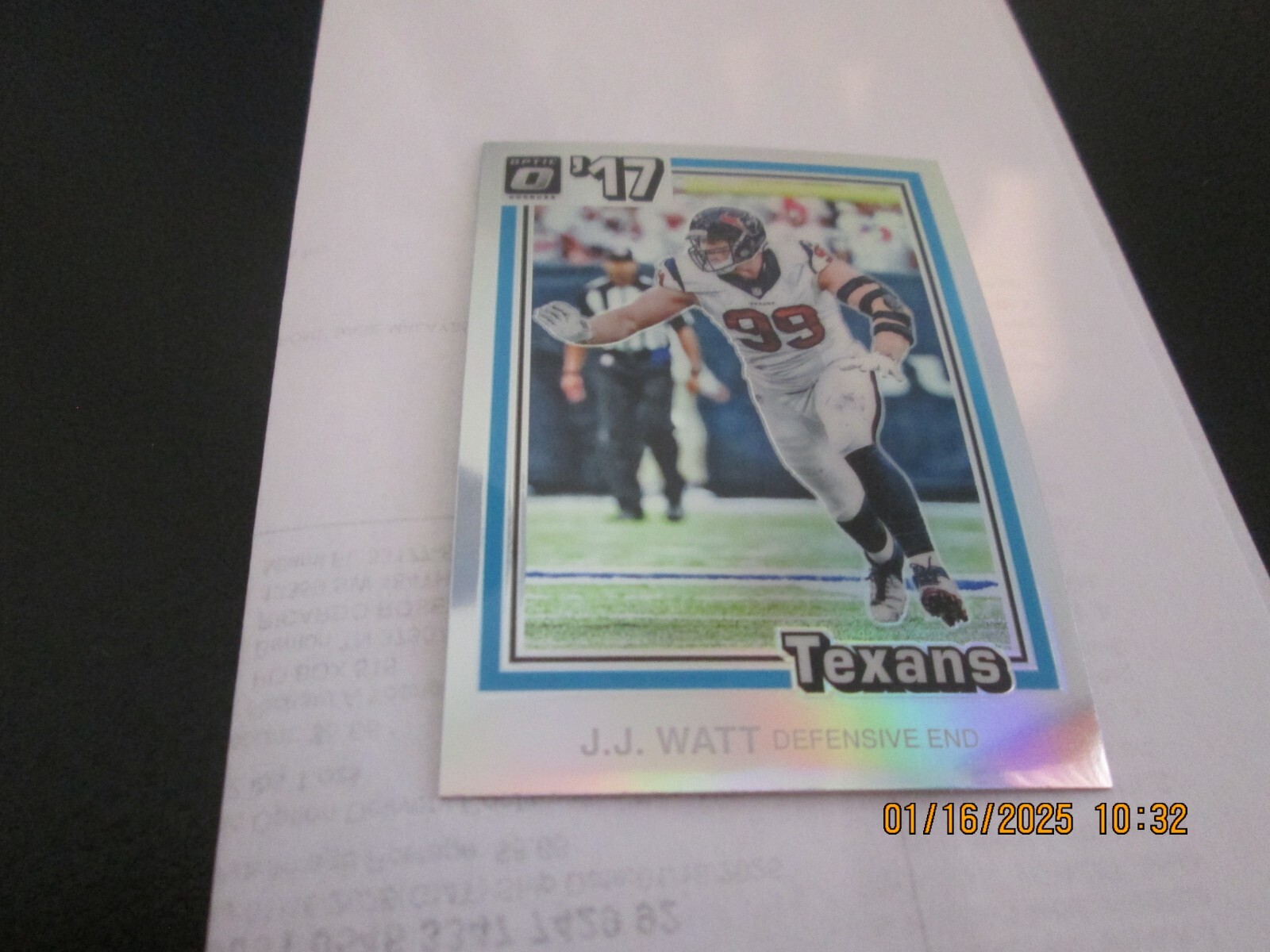 J.J. Watt #20 Football Cards 2017 Panini Donruss Optic 1981 Tribute trading card — raw and PSA graded price guide