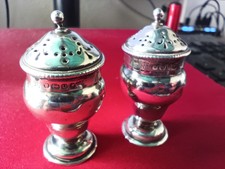 A Pair of Antique Sterling Silver Salt & Pepper shakers Assayed in Sheffield