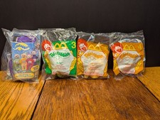 Vintage Teletubbies Fast Food Toys - Lot of 4. New in original packaging.
