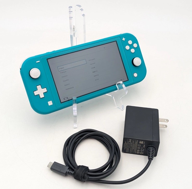 Nintendo Switch Lite light blue 32GB Storage w Adapter and 128gb sd card & case