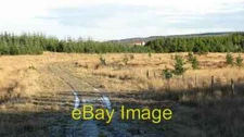 Photo 6x4 Former opencast workings Springhill An unmapped road running th c2010