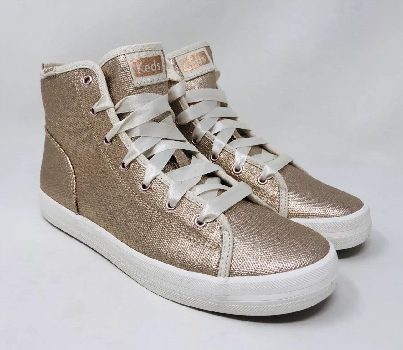 keds champion metallic rose gold