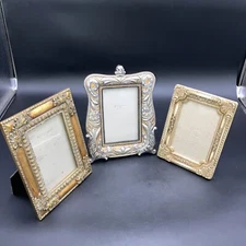 Lot of three Decorative Picture Frames 5x7. 2 Unmarked 1 Six Trees