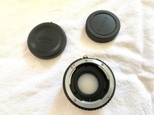 Nikon to micro 4/3 adapter with optics