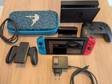 Nintendo Switch 32GO + SD 128GO + Manette Pro + Mario Kart 8 + Pochette Zelda