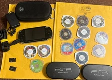 SONY PSP-1001 Console Bundle 10 Games, Universal Cases, 1gb memory and extras